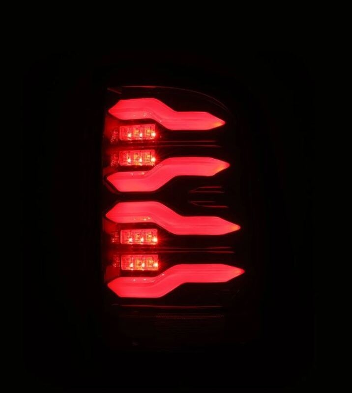 AlphaRex 09-18 Dodge RAM LUXX-Series LED Taillights Black Red w/Actv Light & SS