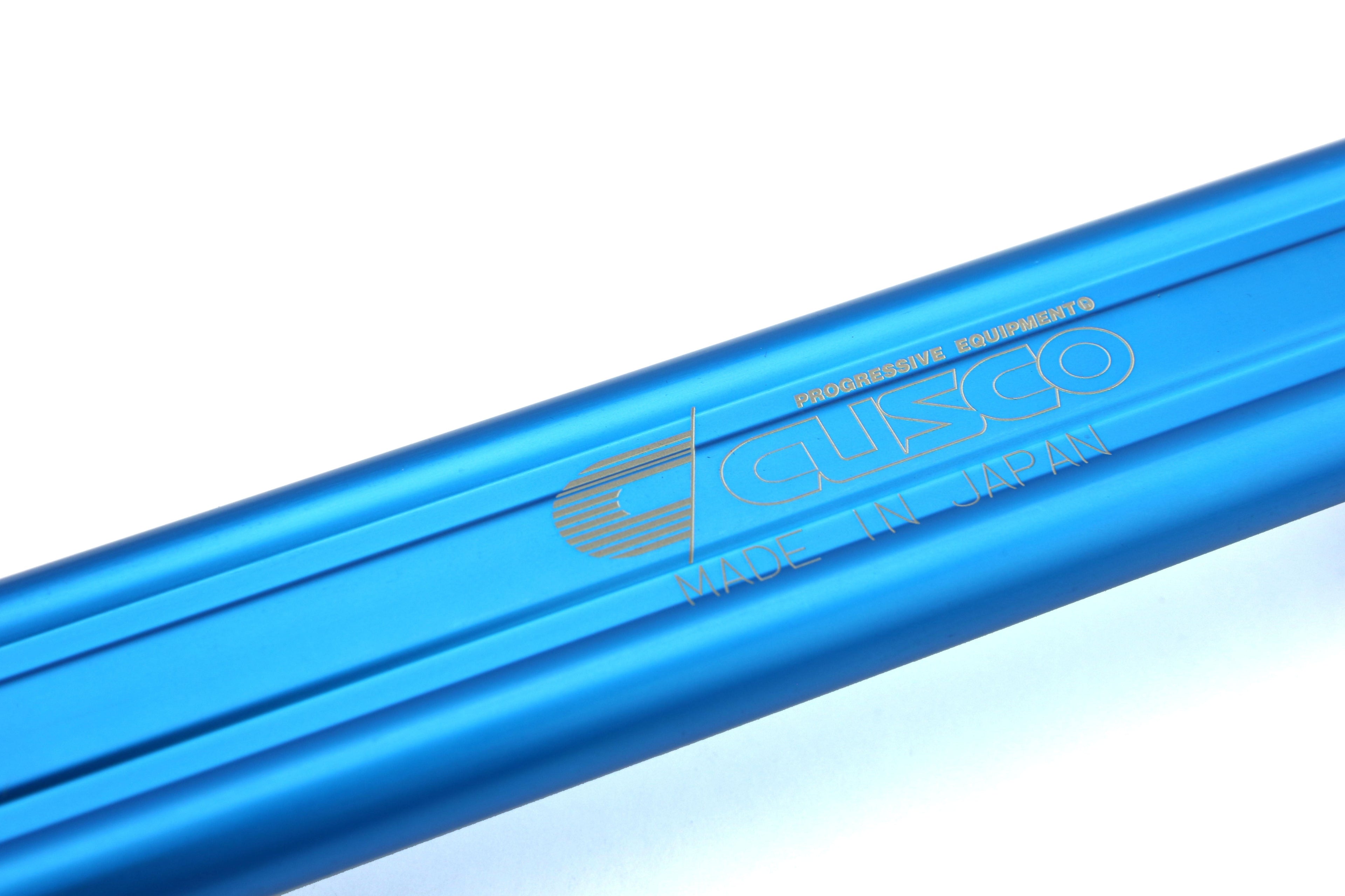 Cusco Battery Tie Down Blue Type B - Universal